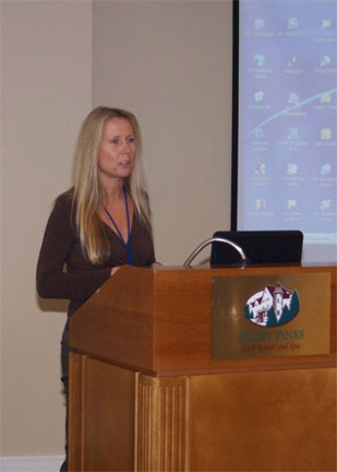Alison Johnson welcomes the crowd to the 2008 AIC Conference.