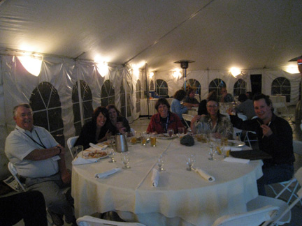From l to r- Phil Downey, Karen Downey, Kathryn Collet, Christine Lipsky, Joan Trial and Scott Craig enjoying a fine meal of smoked fish from the St. Lawrence River